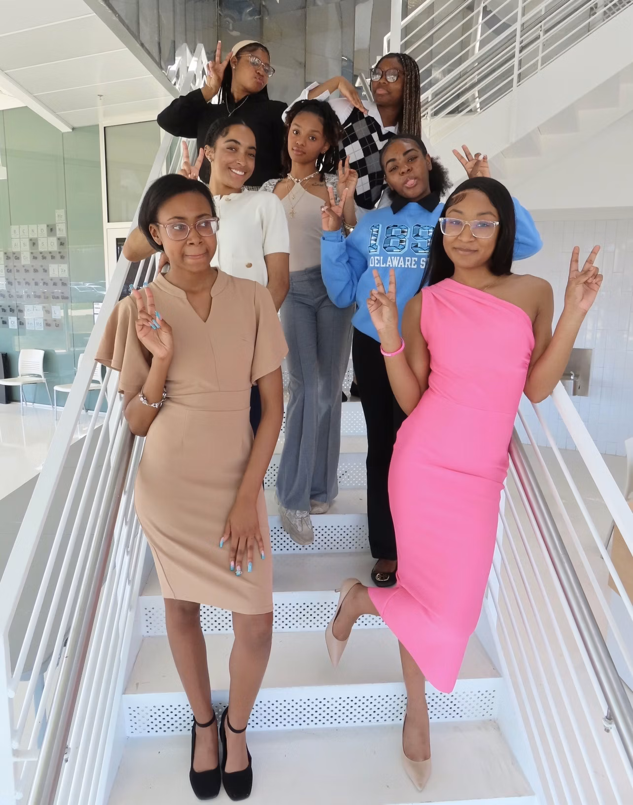 DSU NSBWM members gathering on a staircase